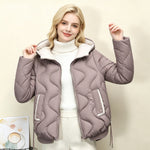 Light taupe quilted short jacket with hood, heart stitching, zip front and drawstring hem.