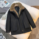 Women's mid-length winter parka in black with faux fur collar and zip front