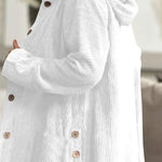 White corduroy hooded jacket with button front and long sleeves