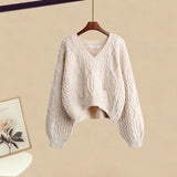 Cable knit V-neck sweater, cream color, long sleeves