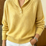 Women’s yellow button-front V-neck long-sleeve sweater with ribbed cuffs and hem.