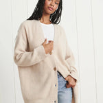 Cozy knit button-front cardigan in beige/cream with V-neck and long sleeves
