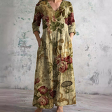 Floral long dress in olive with V-neck and three-quarter sleeves, gathered waist