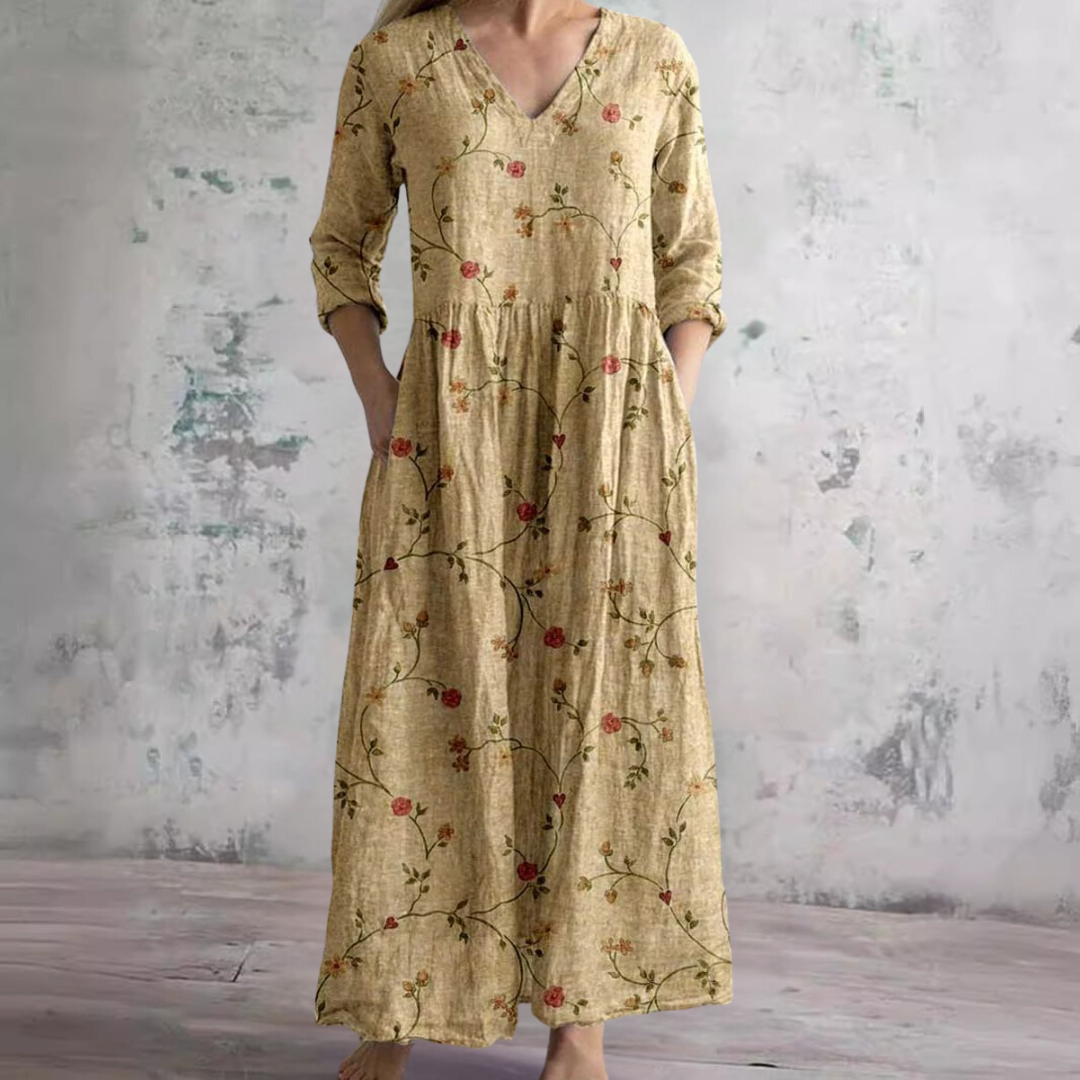 Floral long dress in beige with V-neck and three-quarter sleeves, gathered waist