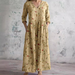 Floral long dress in beige with V-neck and three-quarter sleeves, gathered waist