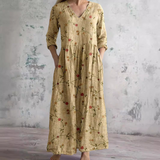 Floral long dress in beige with V-neck and three-quarter sleeves, gathered waist