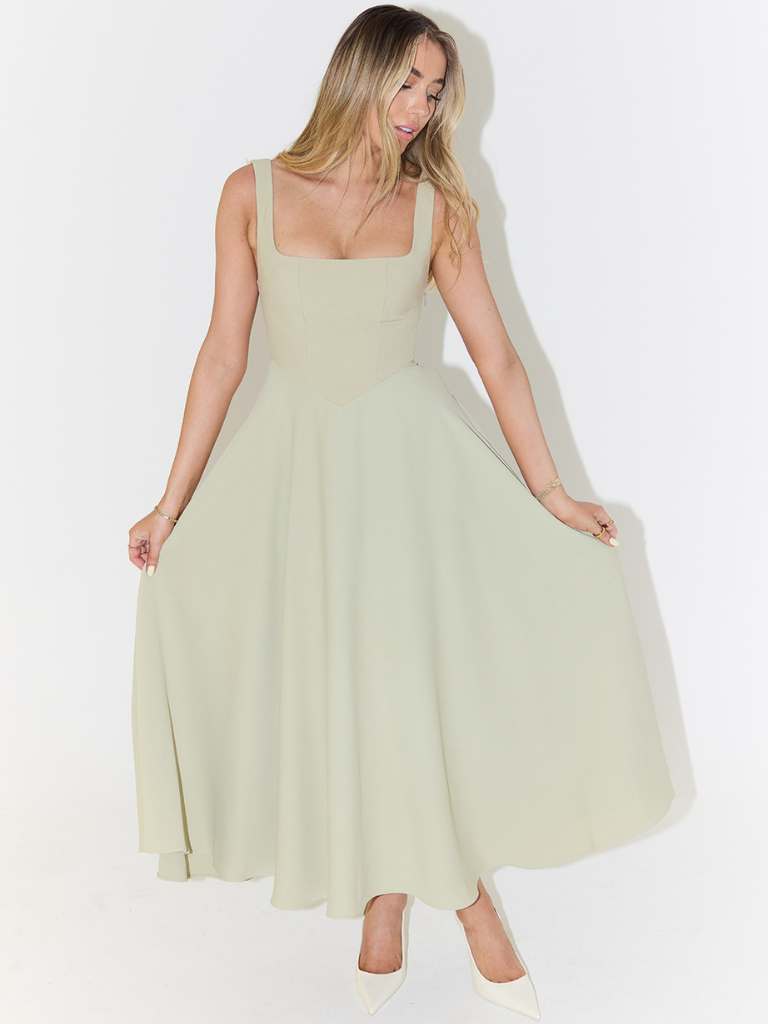 Sage green square-neck sleeveless midi dress, full skirt with gentle flare and pockets