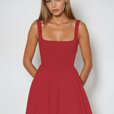 Red midi dress close-up, sleeveless square neckline, fitted bodice, seam detail