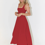 Sleeveless square-neck red midi dress with flared skirt and side-pleated look