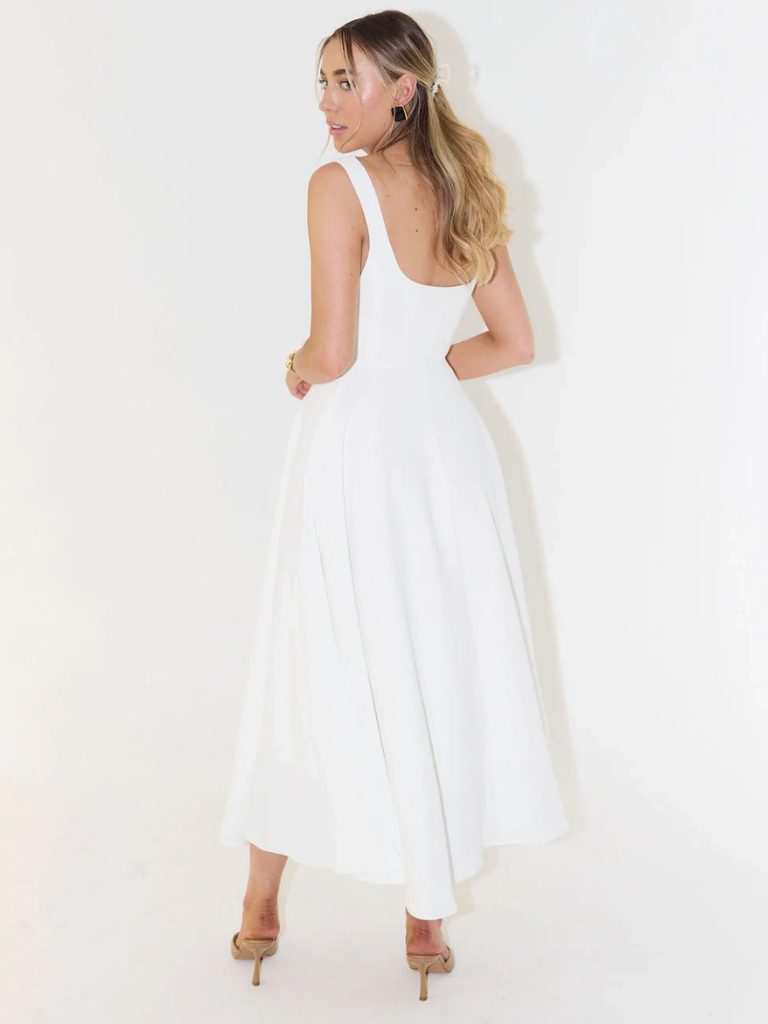 Sleeveless square-neck white midi dress with flared skirt and open back
