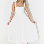 White midi dress side view, sleeveless square neckline, flared skirt, fitted waist