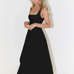 Black square-neck sleeveless midi dress with full skirt and subtle pleats at the waist