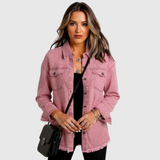 Light pink denim-style jacket with button front, chest pockets, and frayed hem