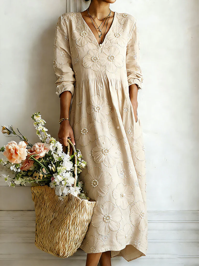 Beige floral midi dress with V-neck and 3/4 sleeves, gathered waist