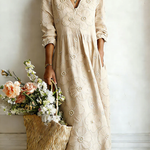 Beige floral midi dress with V-neck and 3/4 sleeves, gathered waist