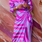 Christiana wrap dress with pink and purple striped print, V-neck, waist-tie belt