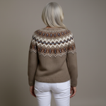 Back view of vintage knit cardigan in taupe with fair isle and beaded motif across yoke