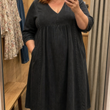 Antonia A-line maxi dress in black, V-neck, 3/4 sleeves, gathered skirt.