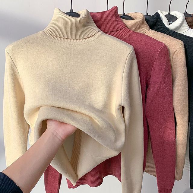 Cream fleece-lined turtleneck sweater with ribbed high neckline
