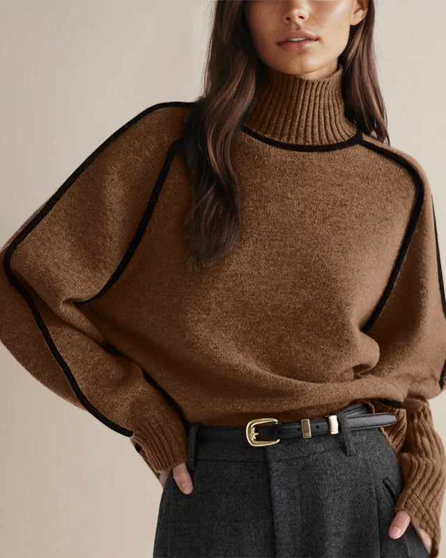 Brown turtleneck sweater with ribbed collar, cuffs, and soft knit texture