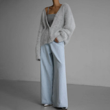 Light gray fuzzy cardigan with V-neck and button front, draped long sleeves