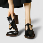 Black orthopedic Mary Jane shoes with side buckle and block heel