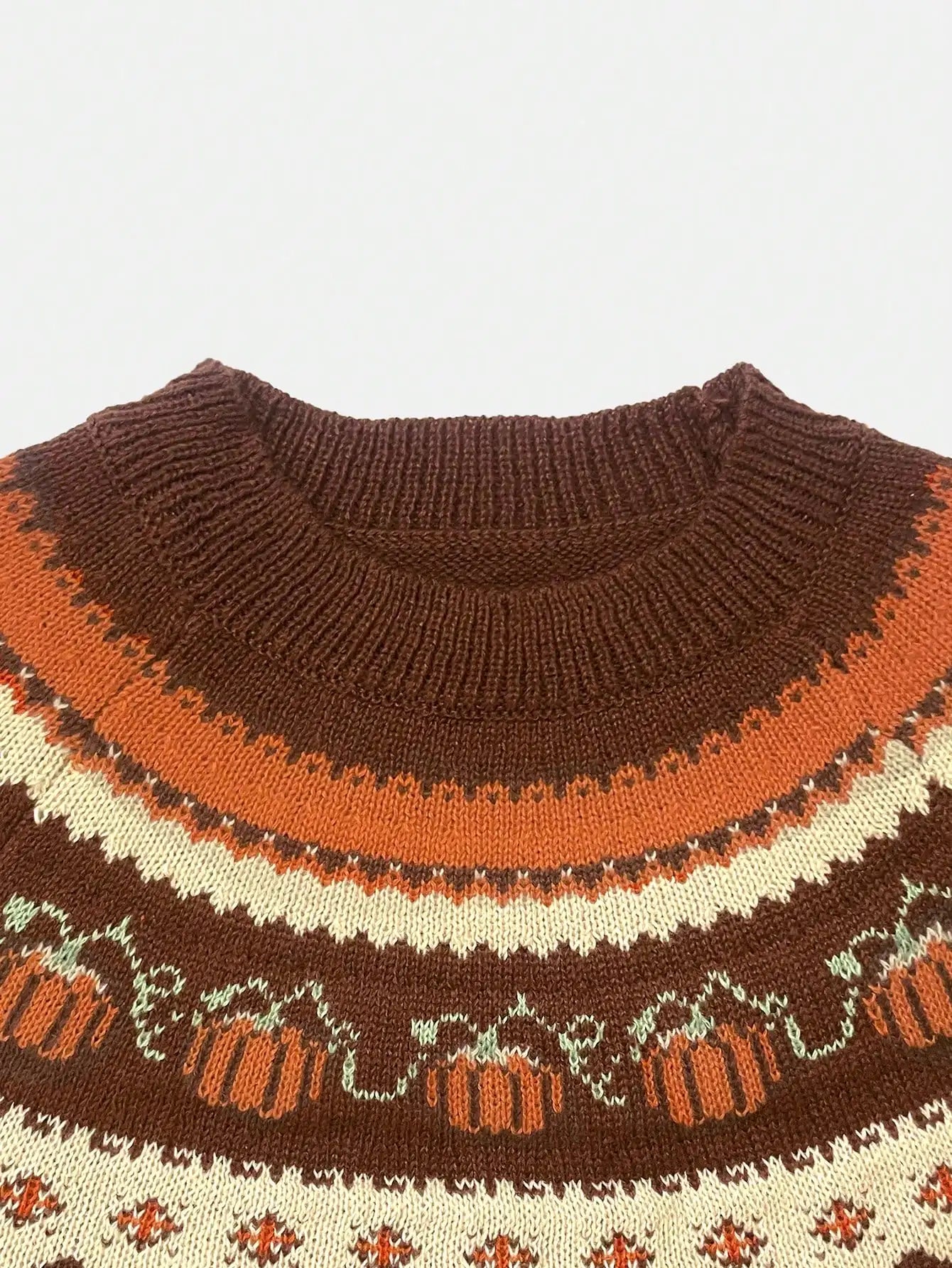 Marion vintage Icelandic sweater neckline and chest, dark brown with Fair Isle stripes