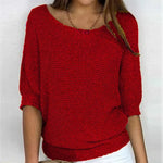 Eunice™ knit top in red; relaxed fit, boat neckline, elbow-length sleeves, ribbed cuffs.