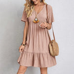 Mauve V-neck tiered midi dress with short sleeves and gathered waist