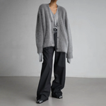 Dark gray fuzzy cardigan with V-neckline and button front, relaxed fit