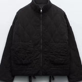 Black cropped quilted jacket with full zip and two flap pockets