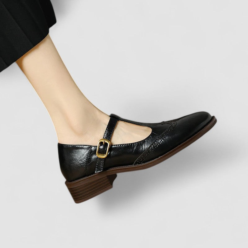 Black orthopedic Mary Jane shoe with side buckle strap and low block heel