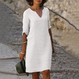 White V-neck midi summer dress with draped sleeve detail and belly coverage