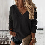 Black V-neck knit pullover sweater with long sleeves and ribbed trim