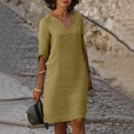 Olive yellow V-neck midi summer dress with draped sleeve detail and belly coverage