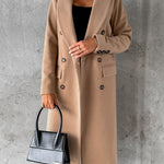 Beige double-breasted overcoat with notch lapels, long sleeves, and buttoned flap pockets