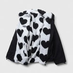 Black-and-white fleece jacket with heart print, full-zip, hood, dark side panels