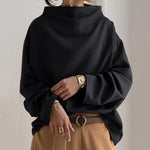 Black high-neck soft knit top with relaxed fit and long sleeves