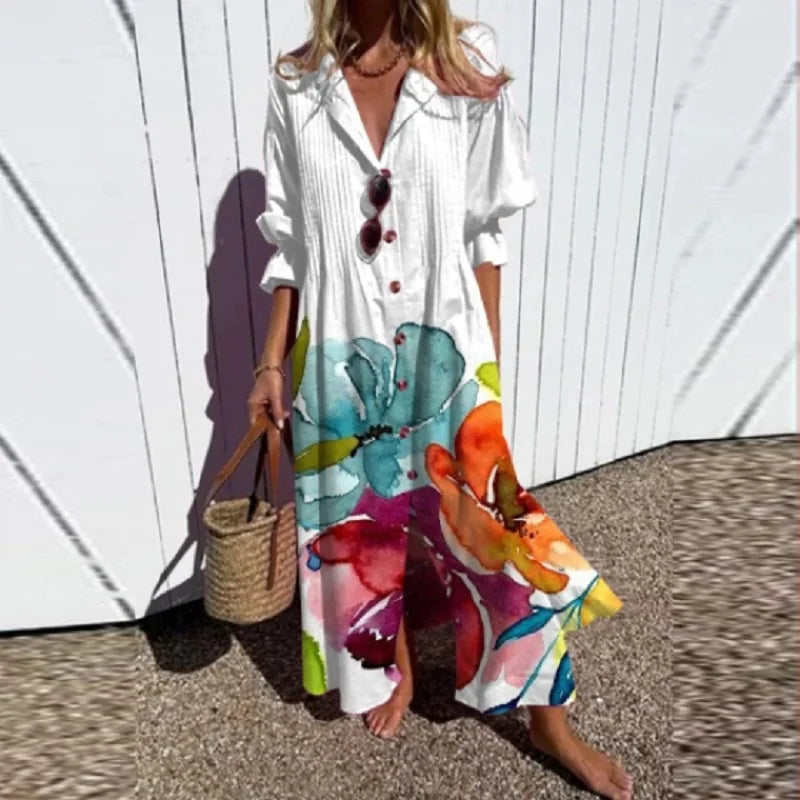 Bohemian maxi dress with white base and colorful painterly print, V-neck, buttons