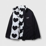 Black and white heart-print fleece zip-up jacket with black side panels