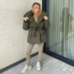Olive green padded hooded jacket with tie belt, long sleeves and button front.