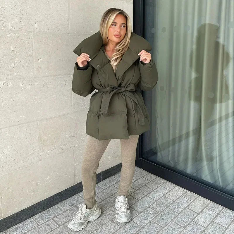 Olive green padded hooded jacket with tie belt, long sleeves and button front.