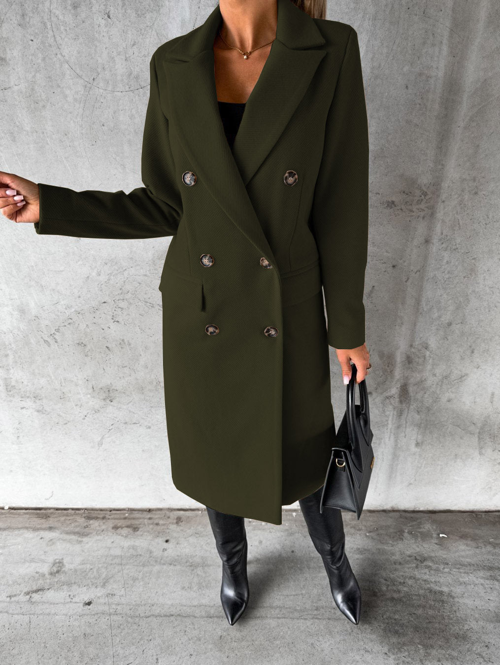 Dark olive double-breasted overcoat with notch lapels, long sleeves, and metal button accents