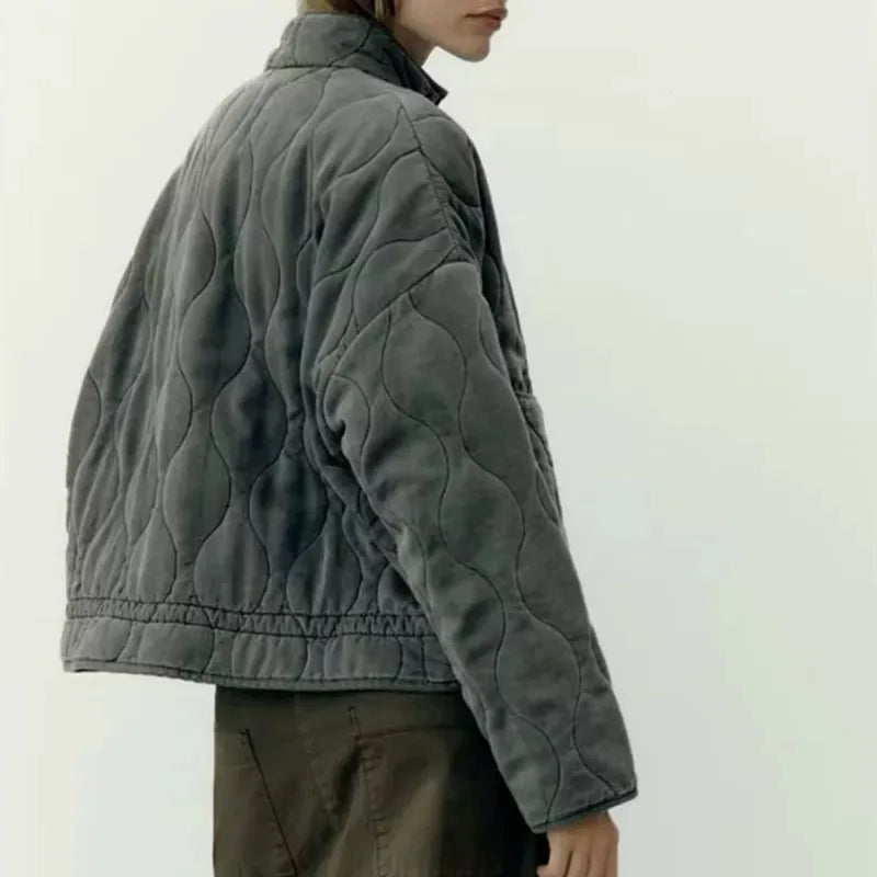 Dark green cropped quilted jacket with full zip and drawstring hem