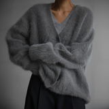 Gray fuzzy button cardigan with V-neck and relaxed, slouchy sleeves