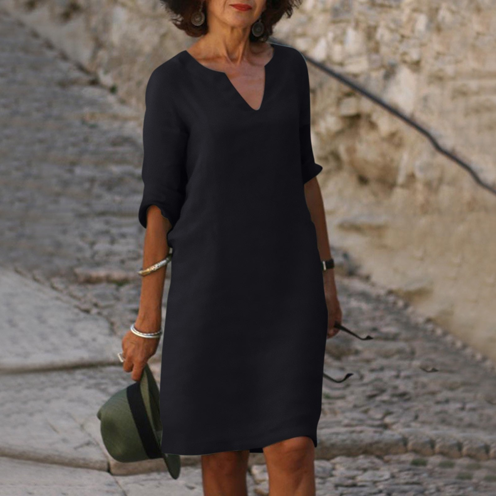 Black V-neck midi summer dress with draped sleeve detail and belly coverage