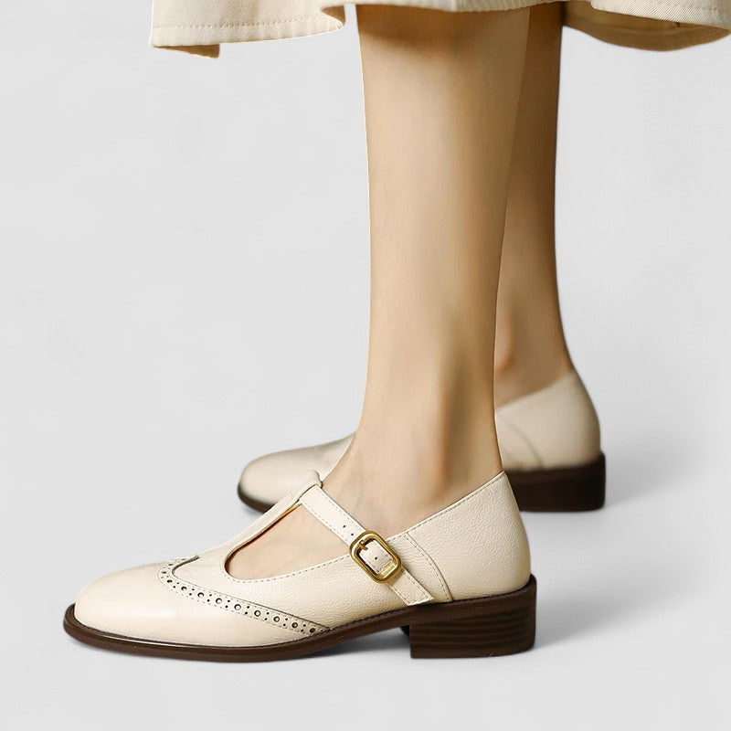 Beige orthopedic Mary Jane shoes with side buckle strap and low stacked heel