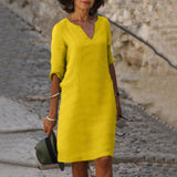Mustard yellow V-neck midi summer dress with draped sleeve detail and belly coverage
