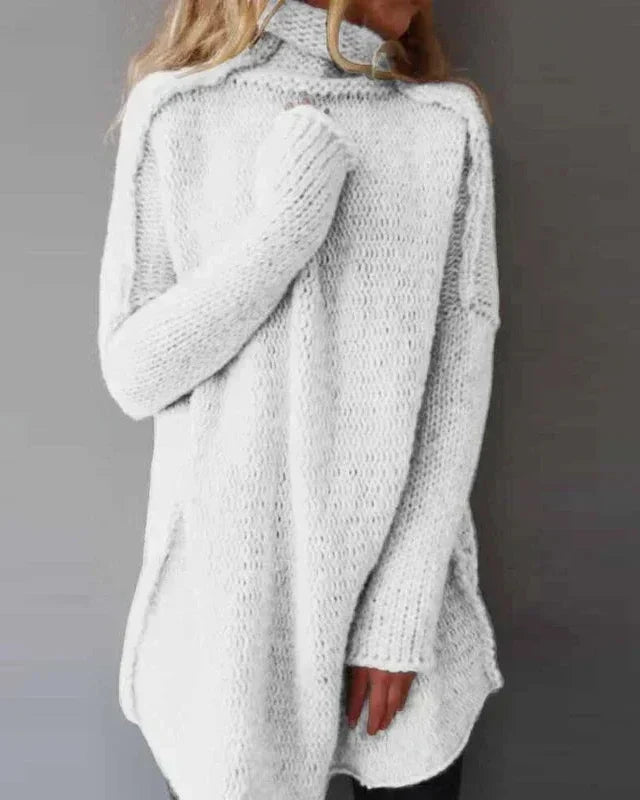 White oversized knitted pullover, high-neck, drop-shoulder fit, ribbed hem