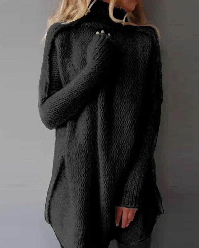 Black oversized knitted pullover, high-neck, long sleeves, ribbed cuffs and hem
